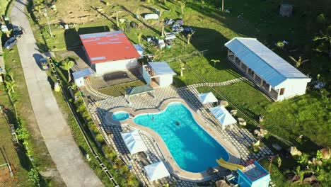 vacationers enjoying the refreshing pool waters in mount caningag, pintuyan, southern leyte, philippines