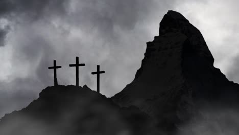 mountains-and-cross-silhouette,-dark-clouds-background