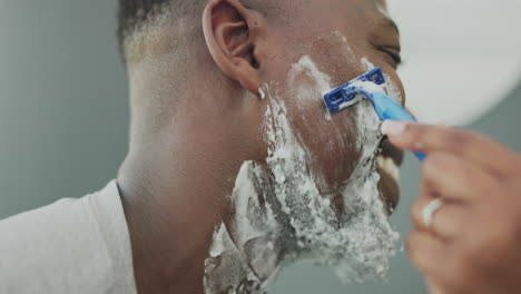 Black-man,-hand-and-helping-with-shaving-cream