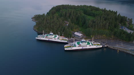 Popular-tourist-destination-Sognefjord-in-Norway---Aerial-orbit-of-still-electric-car-ferry