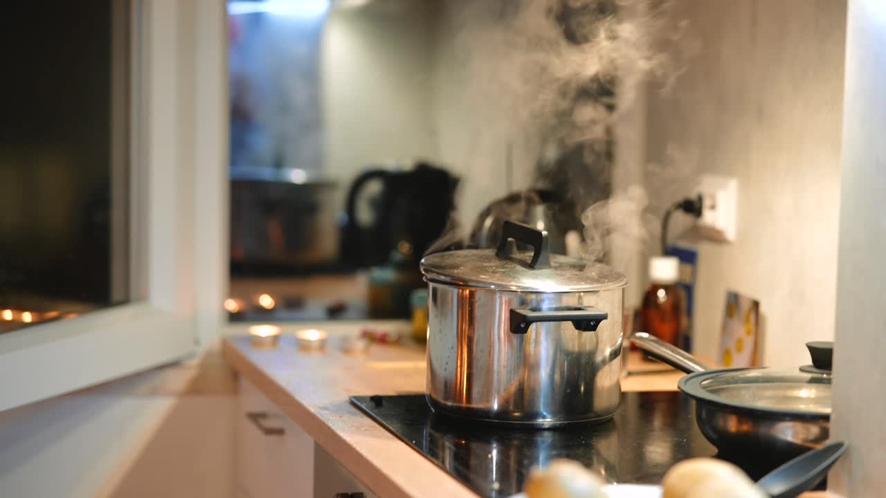A cooking scene with a steaming pot in a kitchen
