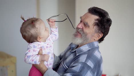 grandfather with a beard wearing glasses