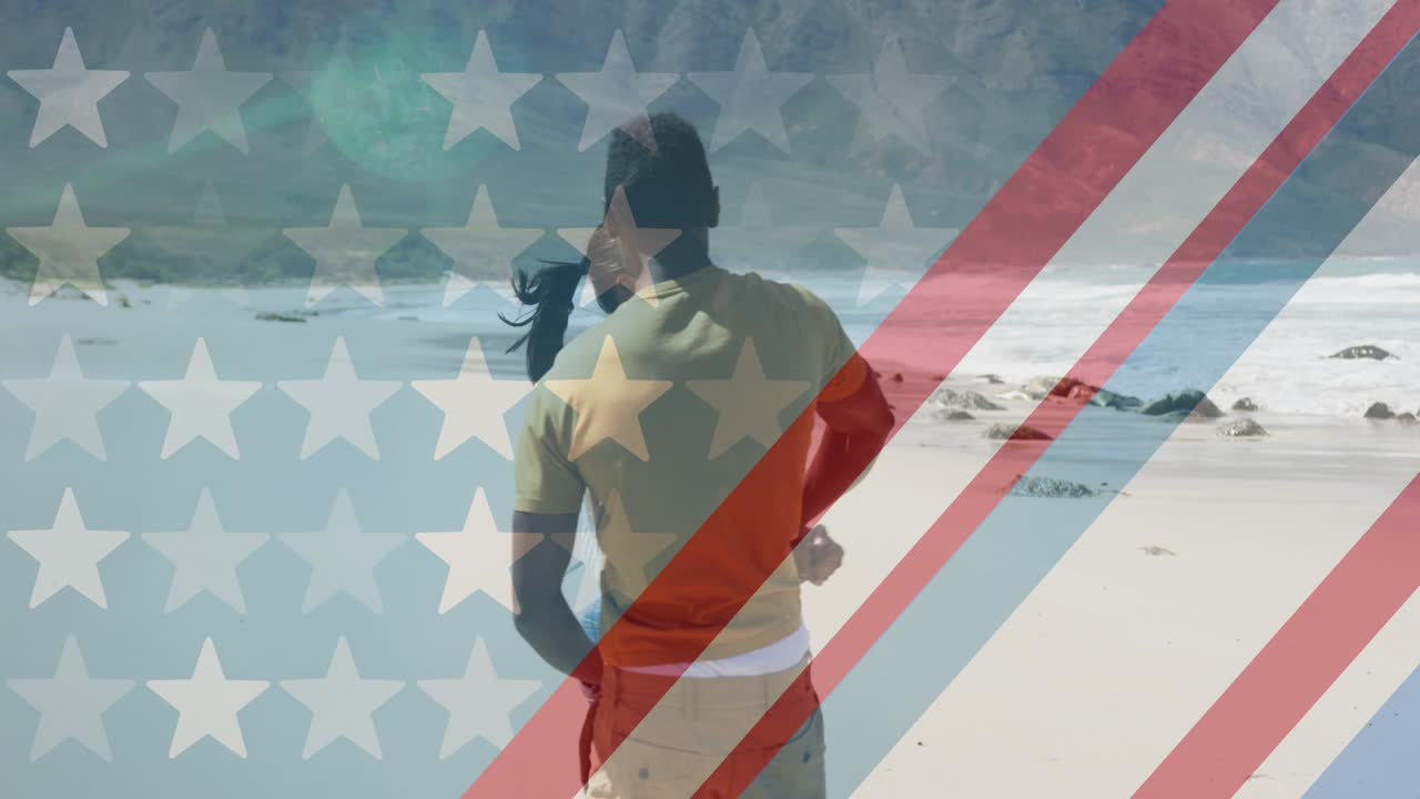 animación de la bandera estadounidense sobre una pareja afroamericana bailando en la playa