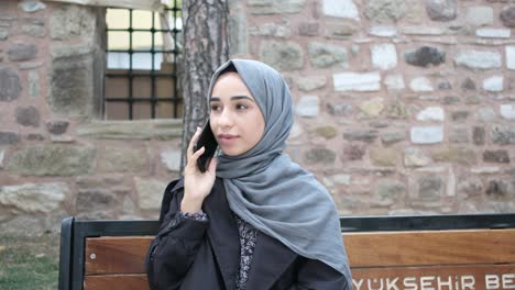 Hijab-woman-talking-with-phone