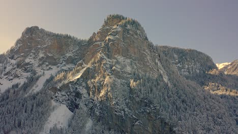 A-Beautiful-Aerial-View-of-The-Snowy-Reserve-of-Sixt-Fer-à-Cheval-during-winter,-French-Alps