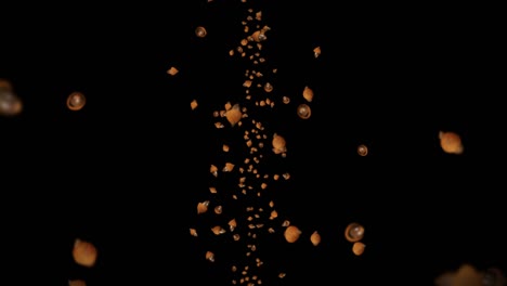 volando muchas bellotas de otoño en fondo negro. símbolo de la caída, nueces de roble, regalos de la caída. animación 3d de semillas de bellota girando. animación de bucle.