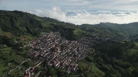 visionary panorama of jerico andean town near medellín valley aerial drone above antioquia in between mountains and epic sky