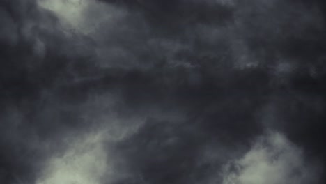 thick,-dark-cumulonimbus-clouds-in-the-sky-accompanied-by-a-thundering-thunderstorm