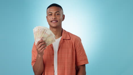 cash, money fan and portrait of a man in studio as