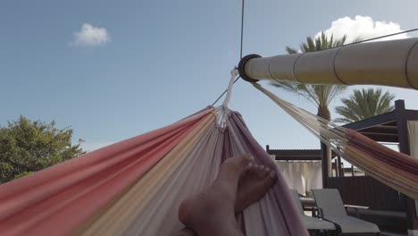 chilling in a hammock on a hot sunny day in the caribbean