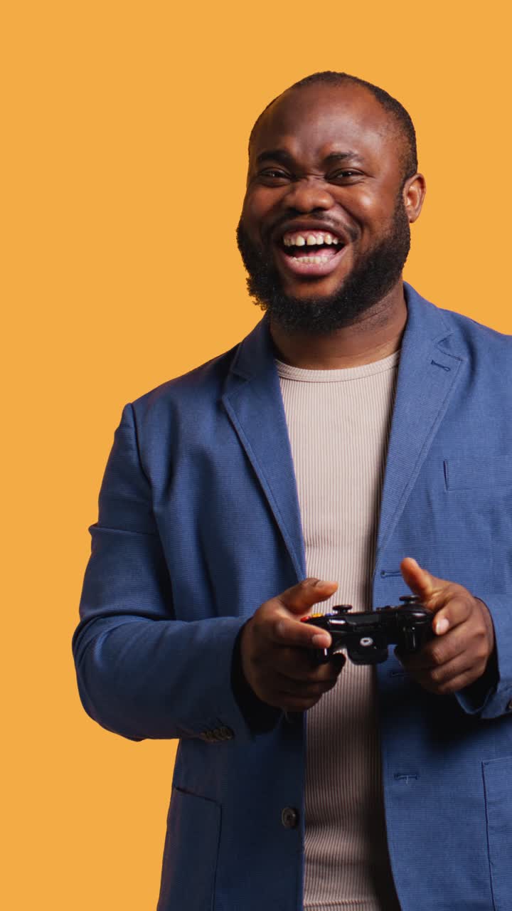 African American Man Playing Video Games with Controller