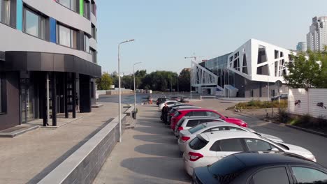 modern cityscape with parking lot and buildings