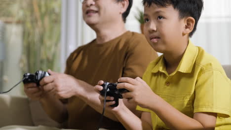 Asian-man-and-boy-in-the-living-room