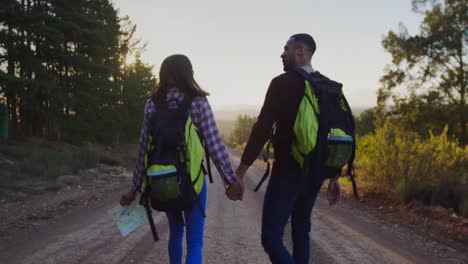 young couple on a trek in countryside