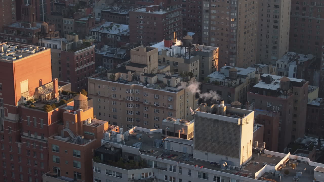 Aerial view of rooftops in New York City. Shot at sunrise in New York City.