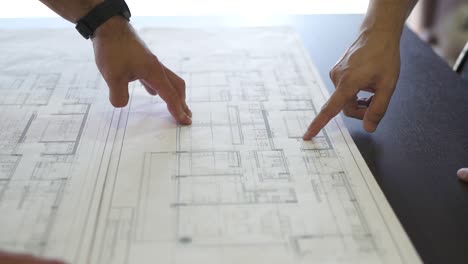 following an architect’s finger across a detailed home plan, the journey of architectural design unfolds