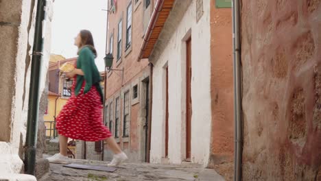 youngtourist woman makes a stop to take photo on vintage camera