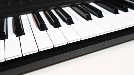 just keys on a keyboard, keyboard sitting at an angle, super smooth rail shot