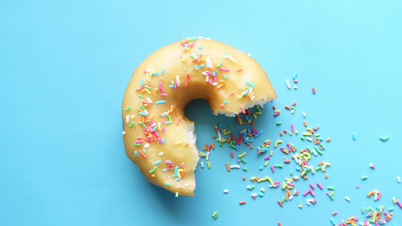Chocolate donuts on plate with copy space