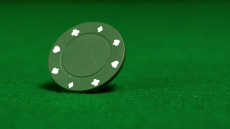 green chip spinning on casino table