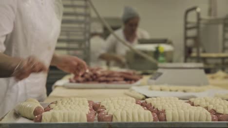 making sausage rolls in a factory