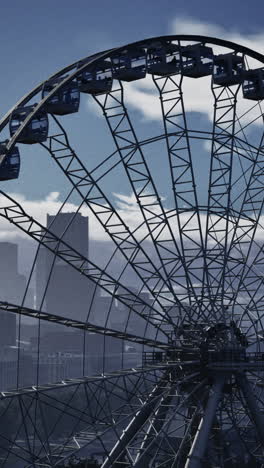 ferris wheel overlooking cityscape