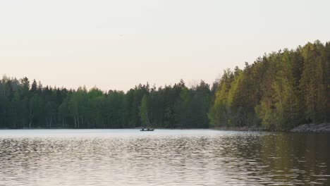 Small-boat-on-a-lake-in-the-evening
