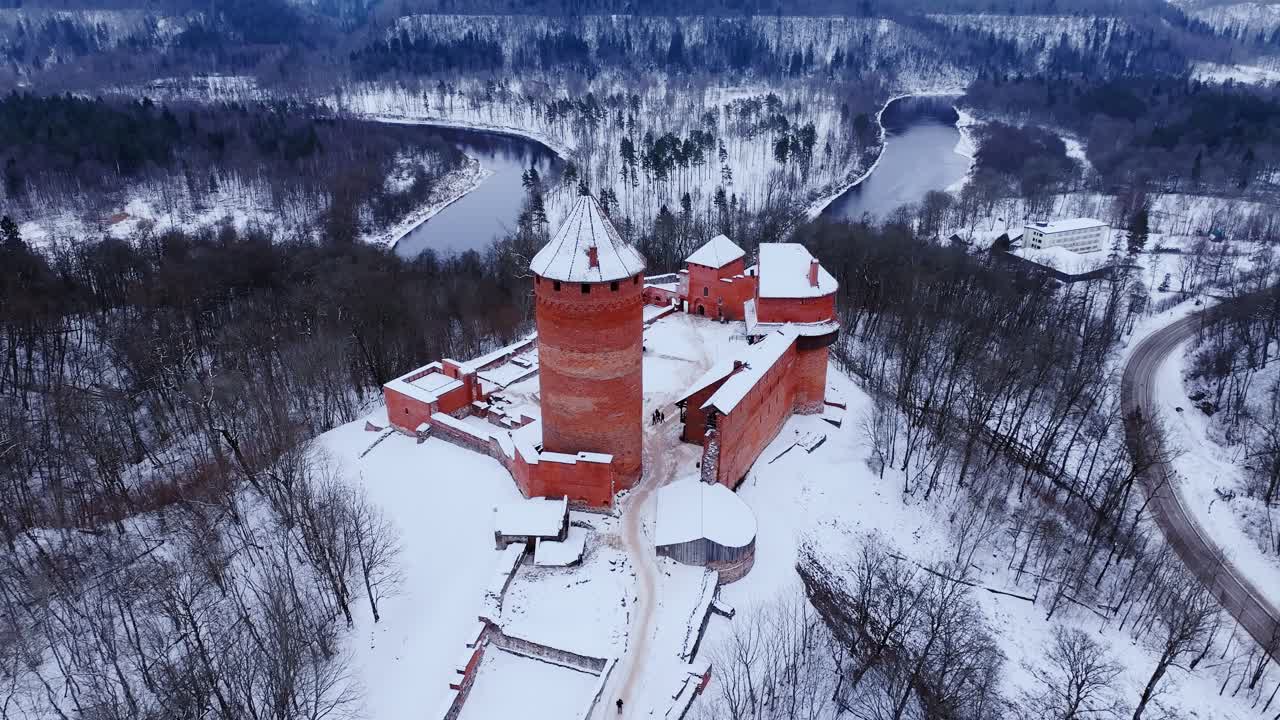Drone flying closer to Turaida Castle, stunning medieval architecture, Latvia