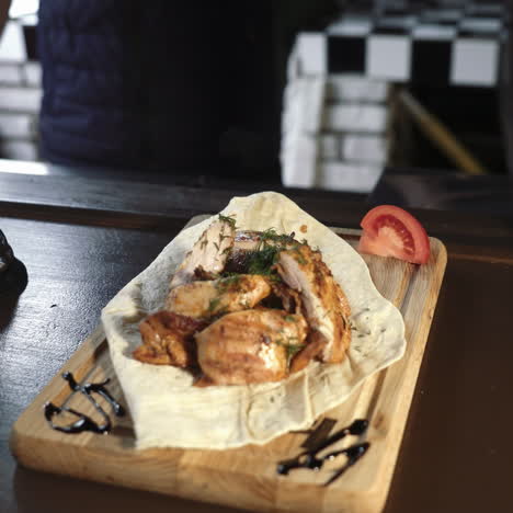 Very tasty cooked kebab on pita bread. Barbecue ready to serve in a restaurant. Delicious grilled meats. Sqare video