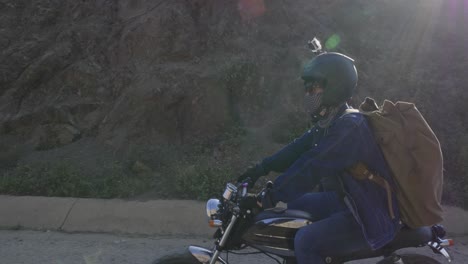 motorcyclist on a scenic dirt road journey