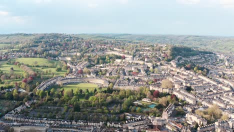 drone shot over old buildings the circus royal crescent in bath uk