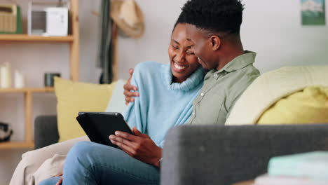 Couple,-digital-tablet-and-sofa-with-happy