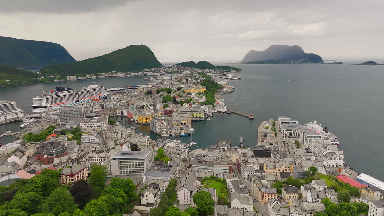 High angle view over touristic sea port town &Aring;lesund with docked cruise ships