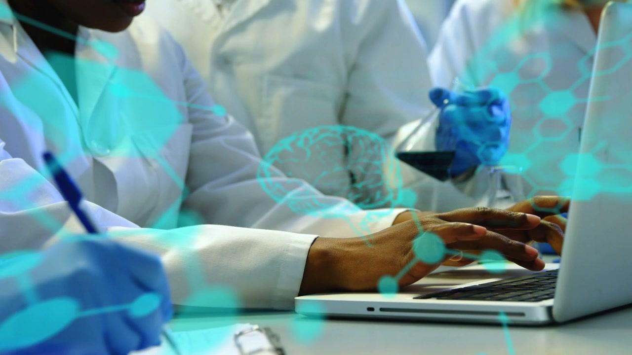 Central researcher pressing keys, entering results, cyan overlay appearing over hands and laptop