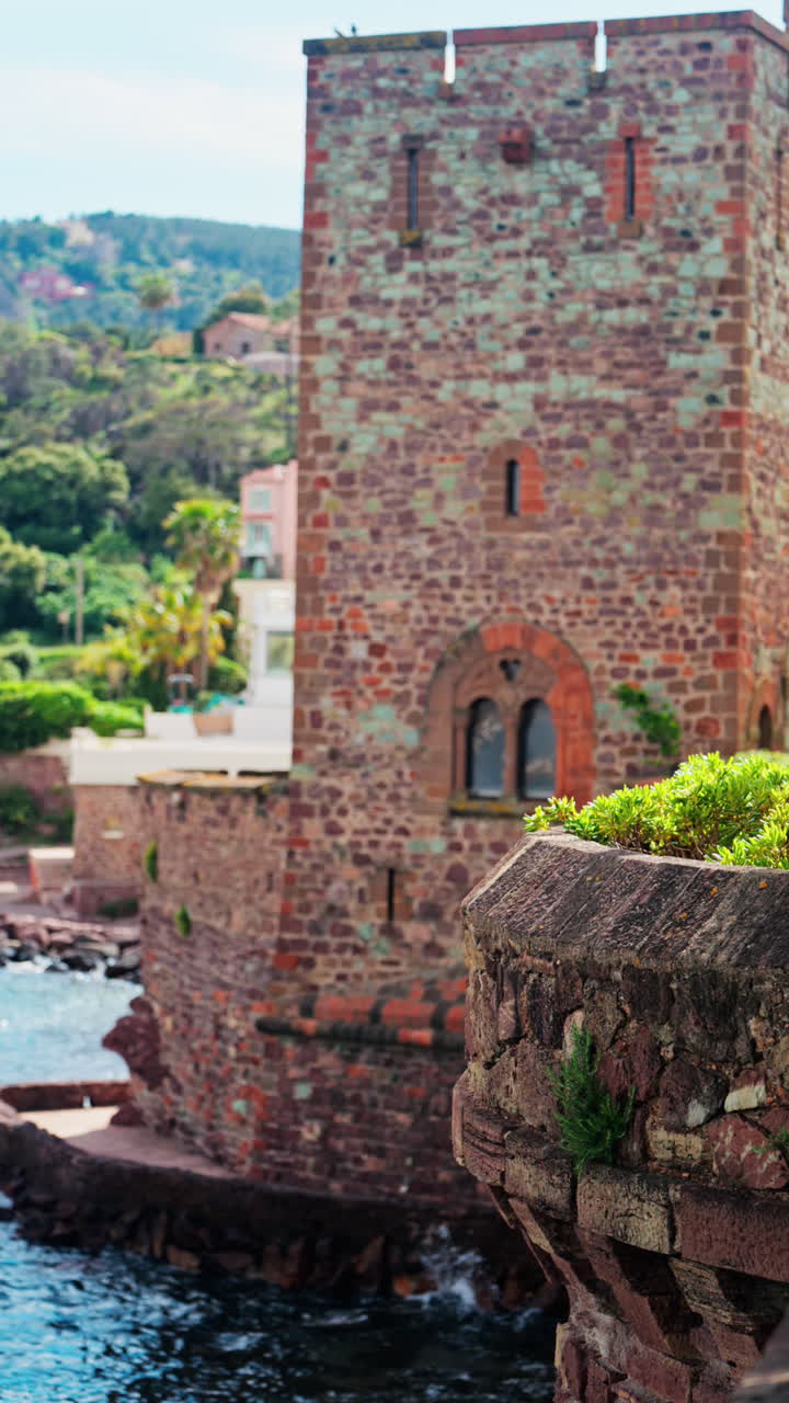 View of the Chateau de la Napoule Castle in Mandelieu-La Napoule, France on the shore of the Mediterranean Sea