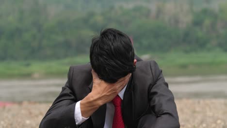 businessman overwhelmed by stress
