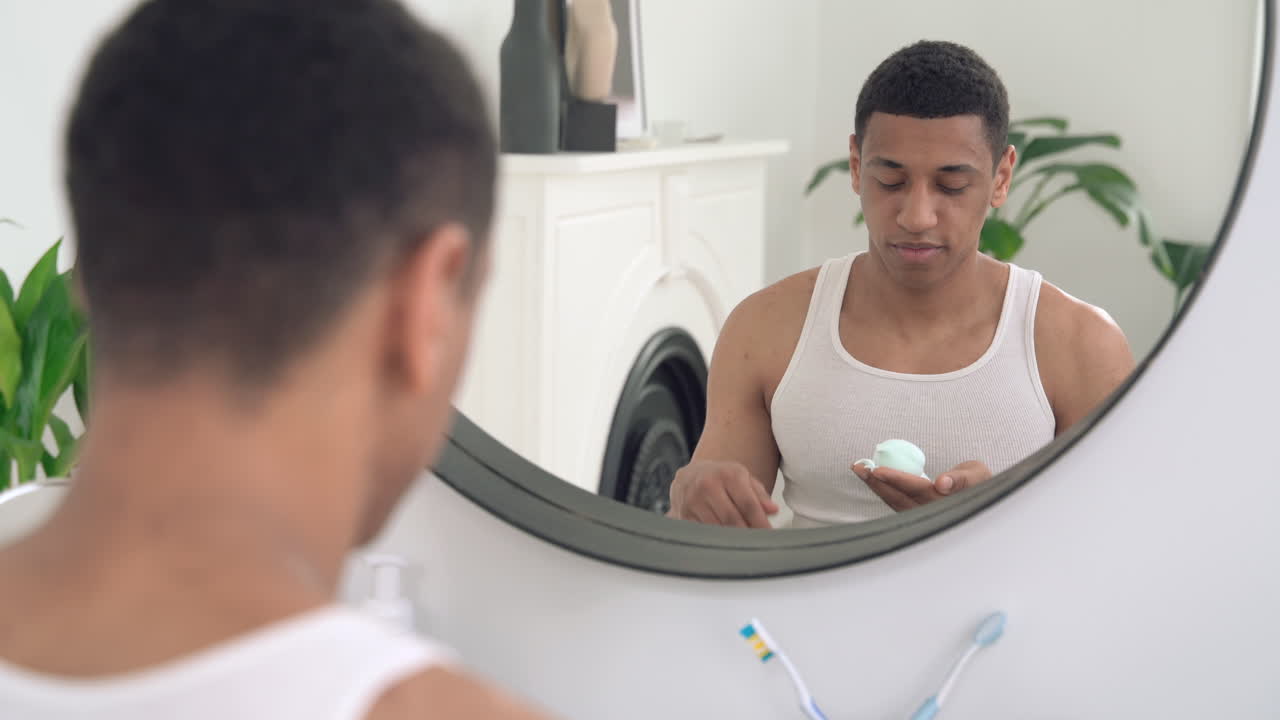 Handsome Black Man Applying Shaving Foam