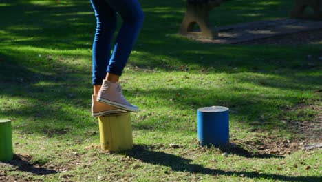 woman playing in the park 4k