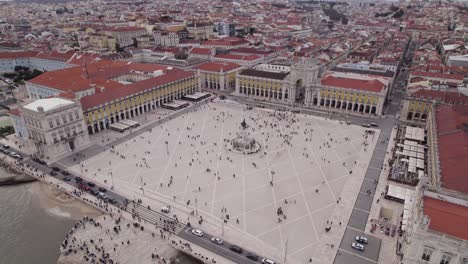 tourist on famous square terreiro do paco in lisbon, portugal, aerial orbit