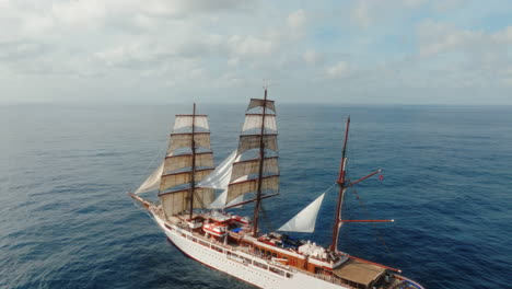 Sea cloud luxury cruise ship sailing vessel in the Atlantic Ocean under clear daylight, Drone shot, Closeup