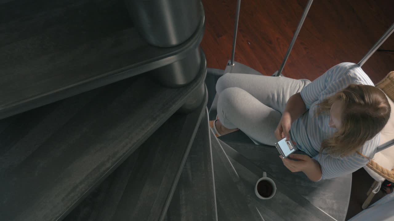 Cinemagraph - Woman Reading Newsfeed in Smartphone