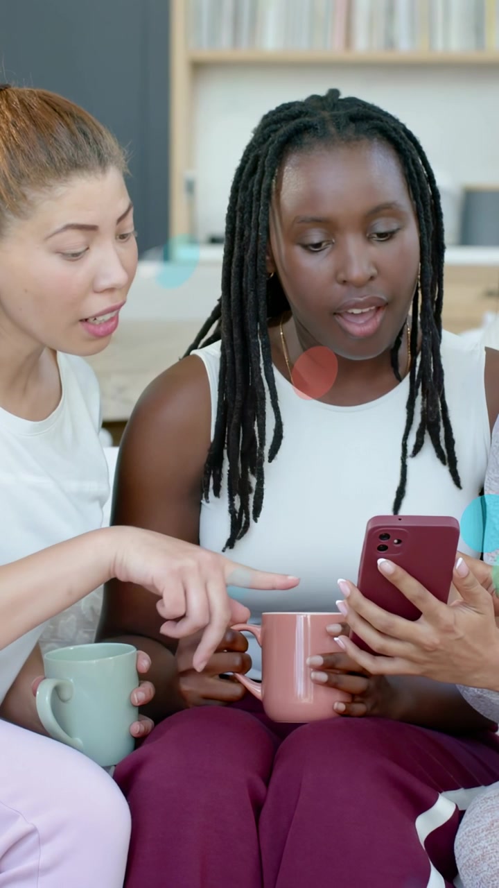 Vertical video: Lead woman tapping red phone on couch pals pointing bubbles popping, sharing social