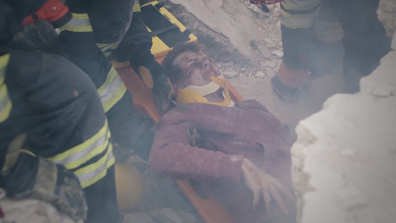 Injured Person Rescued from Building Collapse by Firefighters