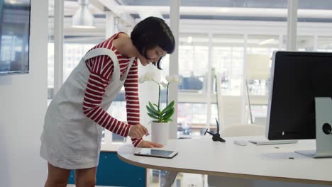 young woman working in a creative office