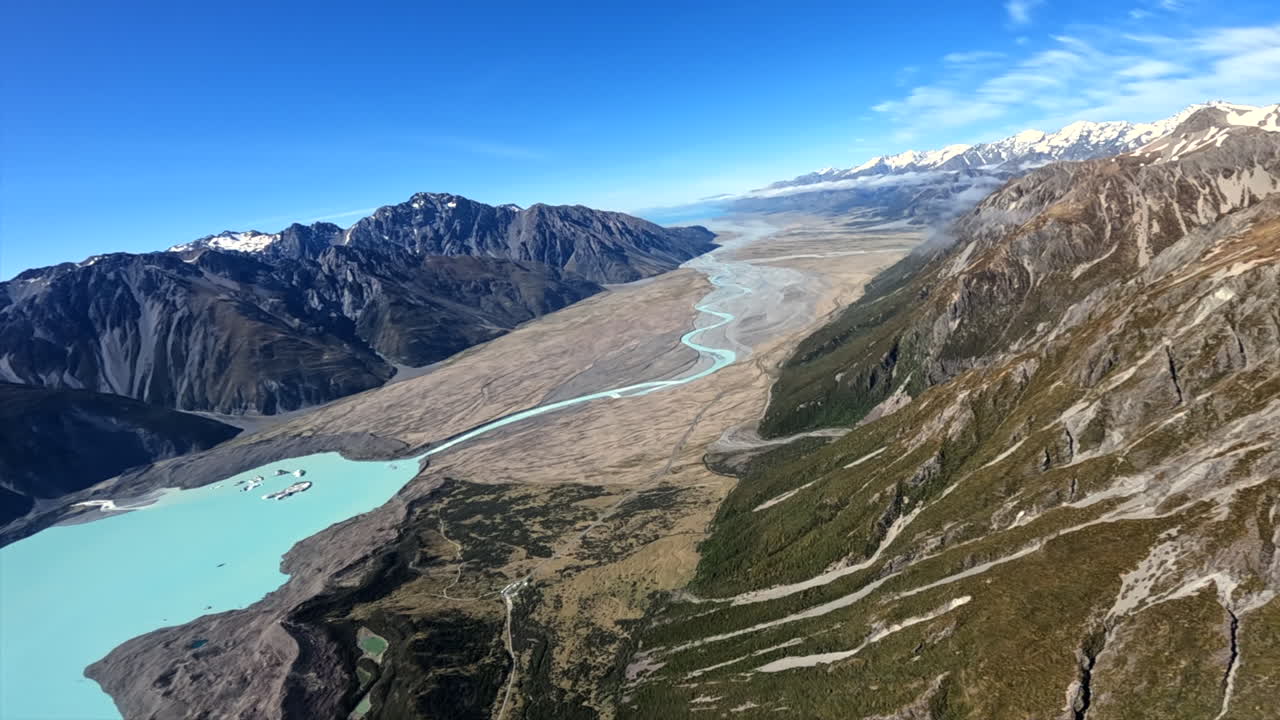 Flying over the Tasman lake towards Mount cook airport, Southern Alps New Zealand