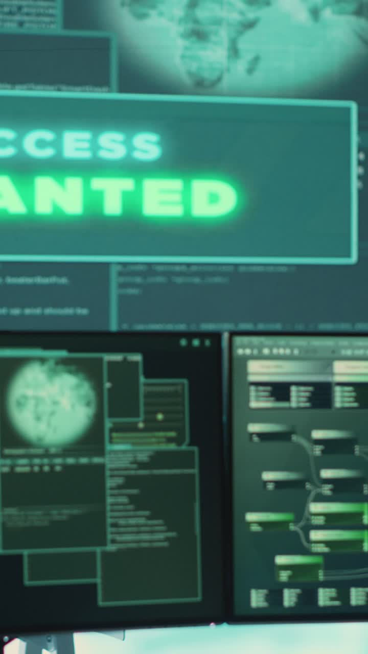 Hacker Man Gaining Access on Multiple Digital Screens