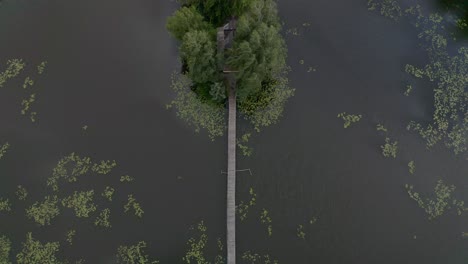 Ukraine---Bird's-eye-view-of-the-famous-Fisherman's-cabin-in-the-tiny-Island-of-the-lake---Drone-footage