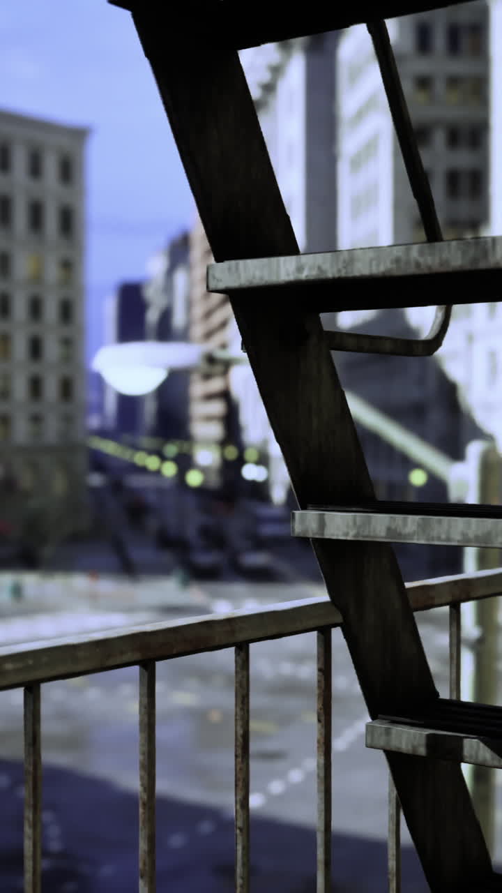 City view from an apartment balcony with fire escape and skyline