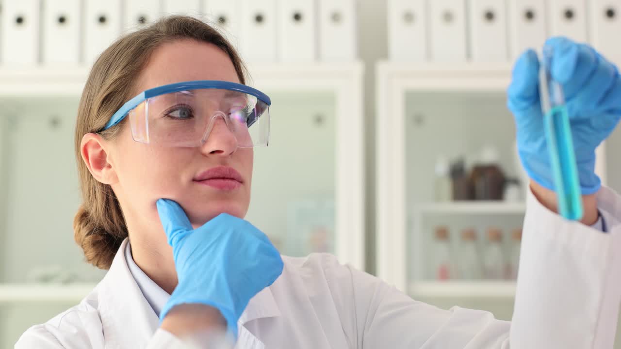 Scientist Analyzing a Test Tube in the Lab
