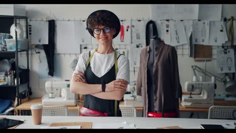 confident fashion designer in her studio